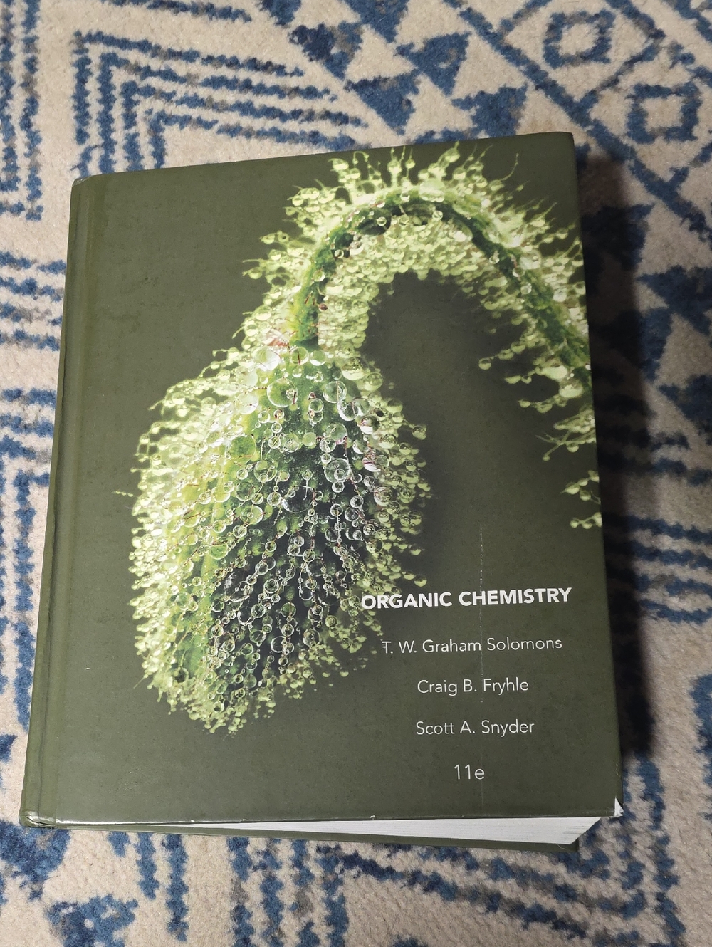 Organic Chemistry Textbook with Green Botanical Cover